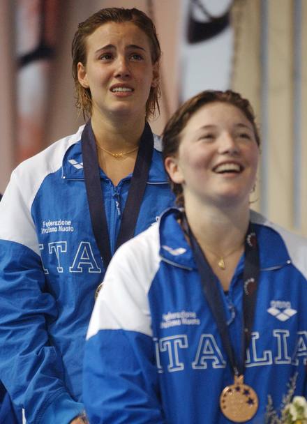 Madrid 2004: Valentina Marocchi e Tania Cagnotto sul podio dopo i tuffi dalla piattaforma (Ap)